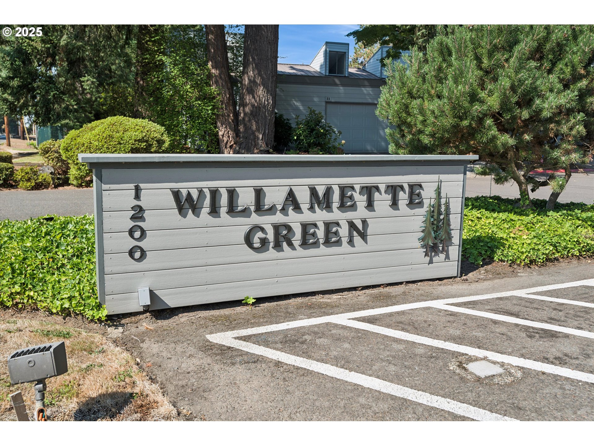 1200 Northeast Territorial Road, Unit 93 Canby, OR 97013 - Photo 36 of 36 a view of outdoor space with signage and flags