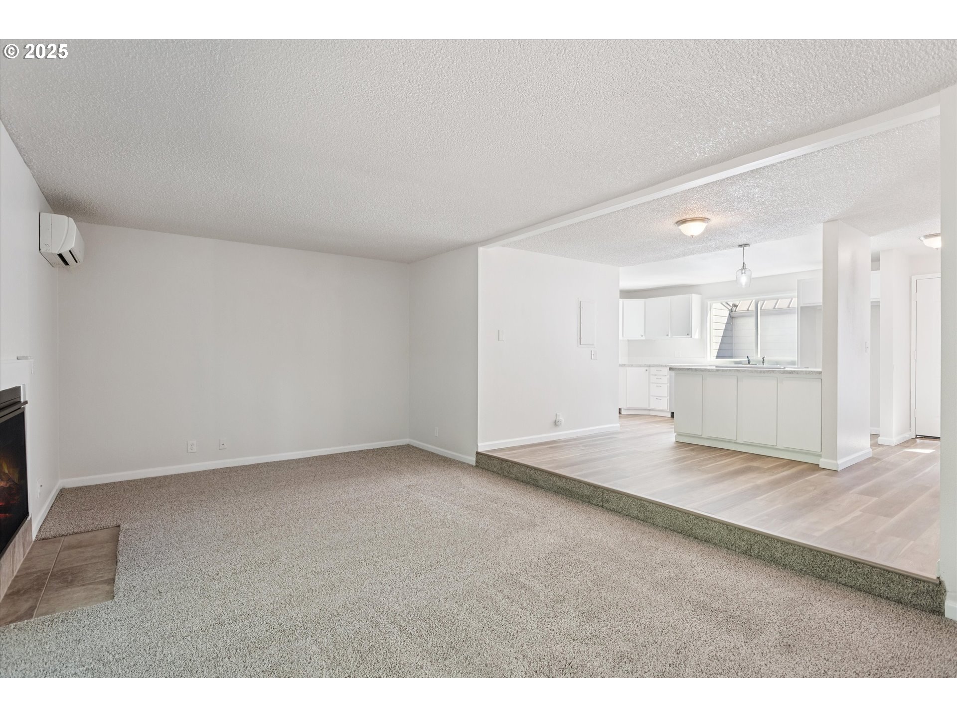 1200 Northeast Territorial Road, Unit 93 Canby, OR 97013 - Photo 10 of 36 a view of an empty room and kitchen view
