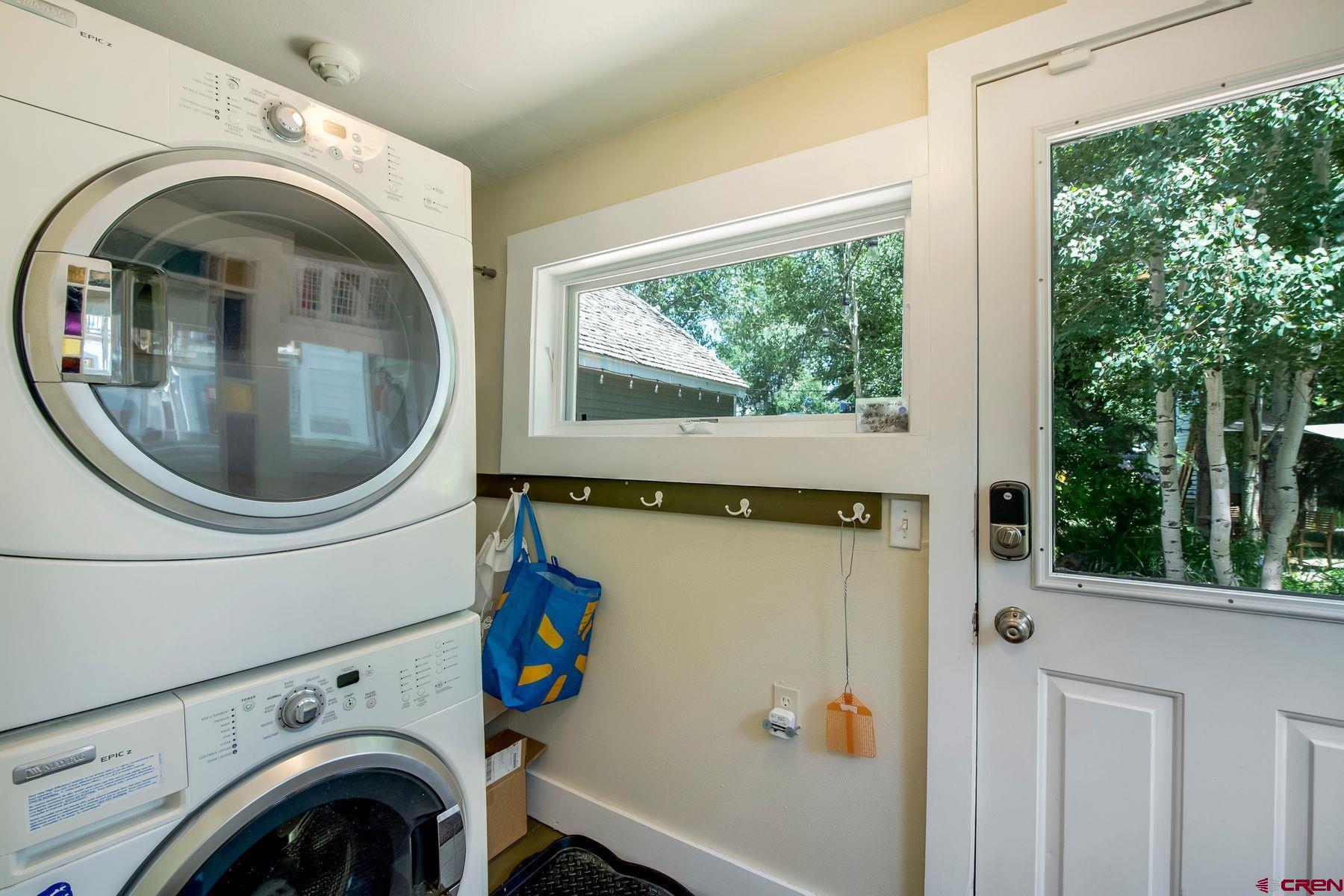 721 Maroon Avenue Crested Butte, CO 81224 - Photo 21 of 31 a utility room with dryer and washer