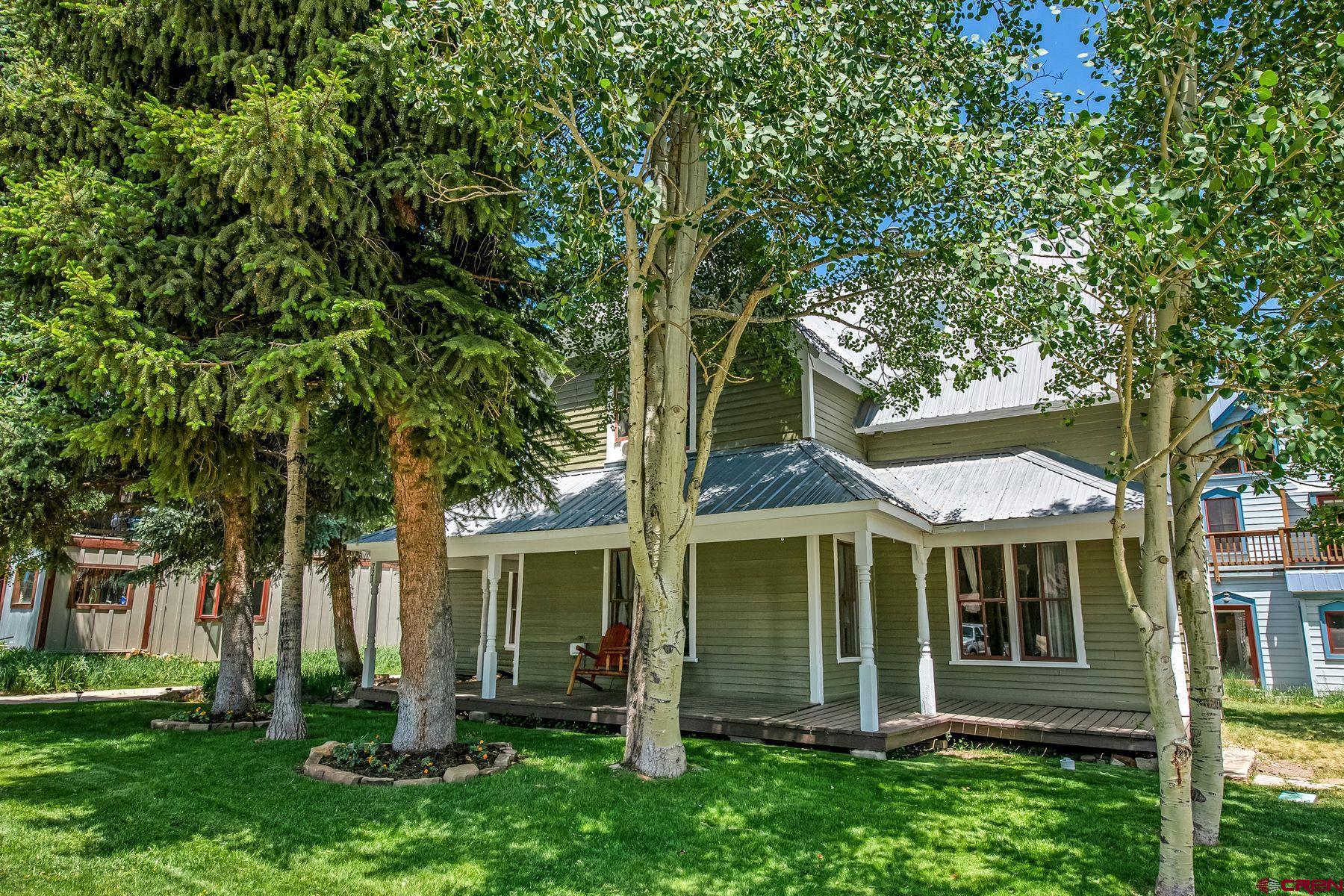 721 Maroon Avenue Crested Butte, CO 81224 - Photo 22 of 31 front view of a house with a tree