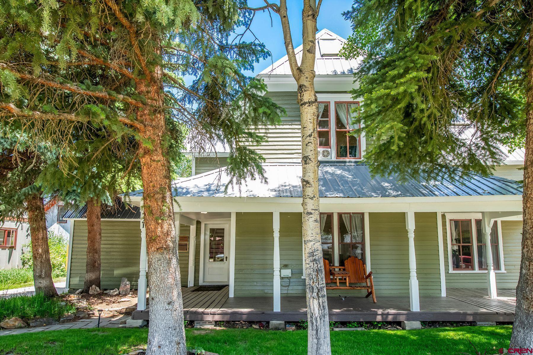 721 Maroon Avenue Crested Butte, CO 81224 - Photo 3 of 31 a front view of a house with garden