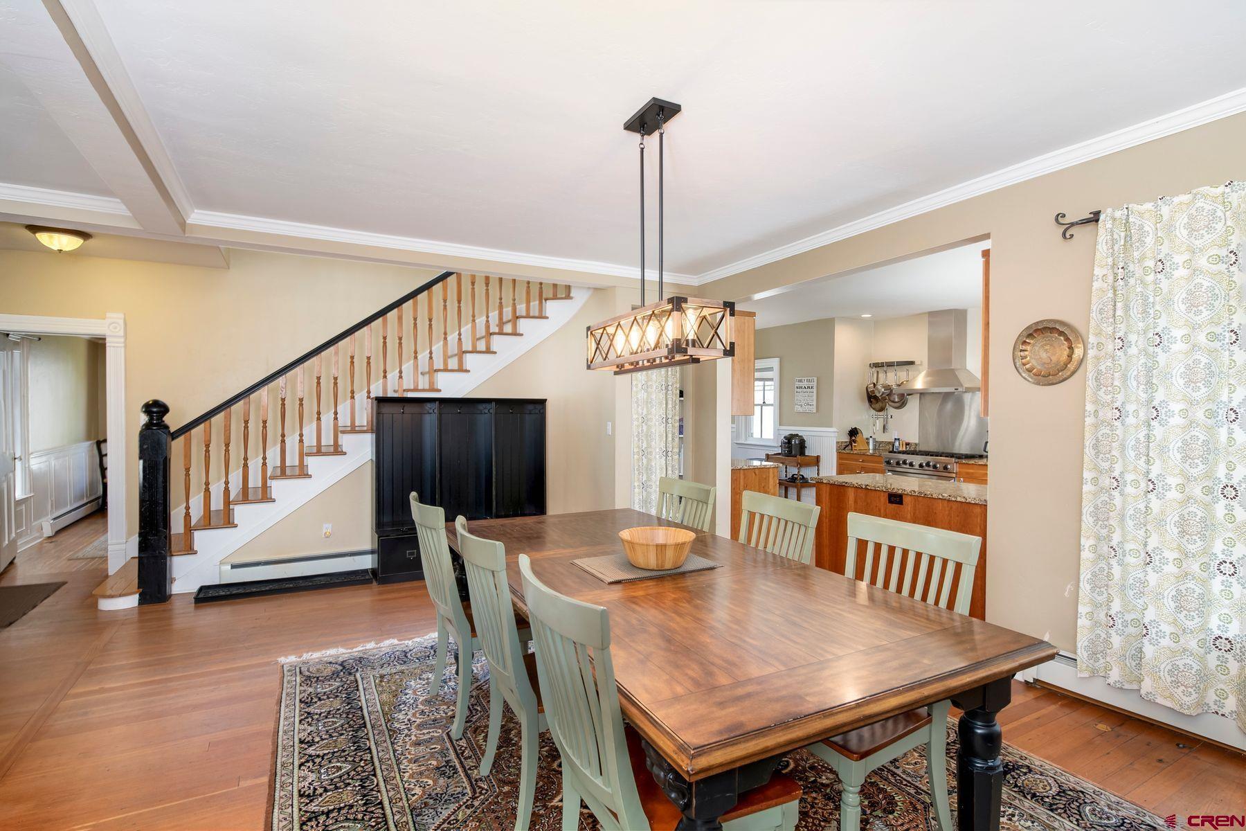 721 Maroon Avenue Crested Butte, CO 81224 - Photo 9 of 31 a view of a dining room with furniture and wooden floor