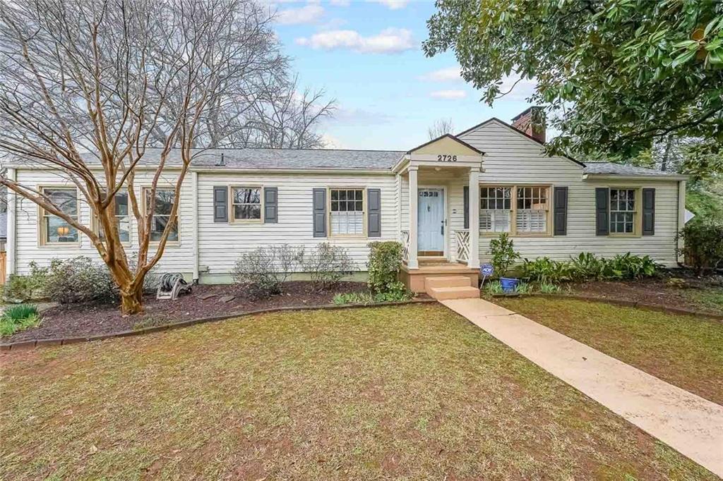 2726 Craigie Avenue Decatur, GA 30030 - Photo 1 of 1 a front view of a house with yard and green space