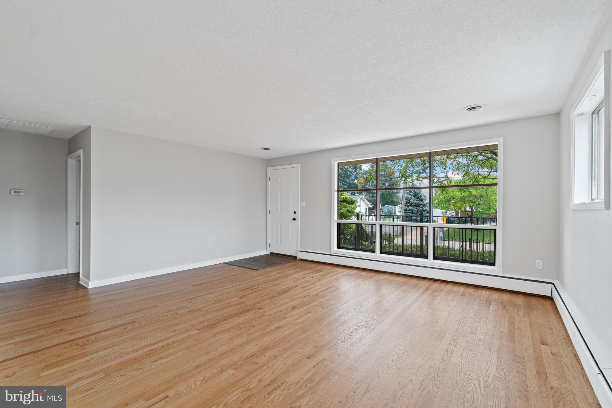 248 Asbury Road Pasadena, MD 21122 - Photo 5 of 32 Front Windows in Living Room