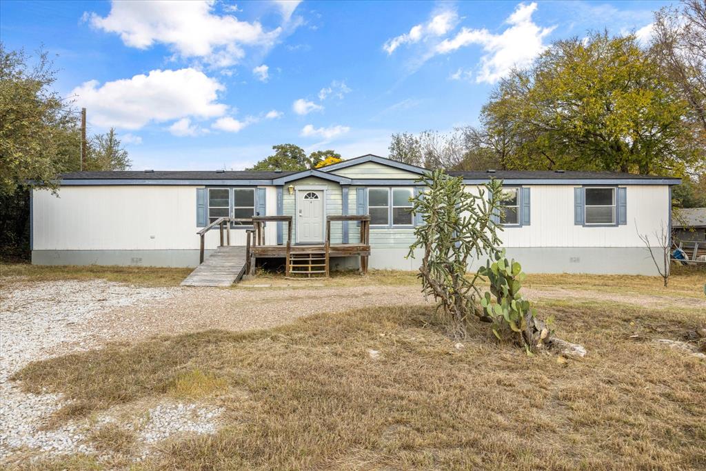 2903 Centaurus Way Granbury, TX 76048 - Photo 2 of 31 Manufactured / mobile home featuring crawl space and a front yard