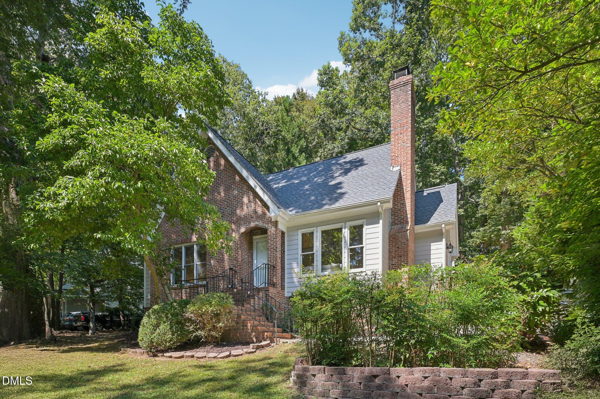 a house view with a garden space