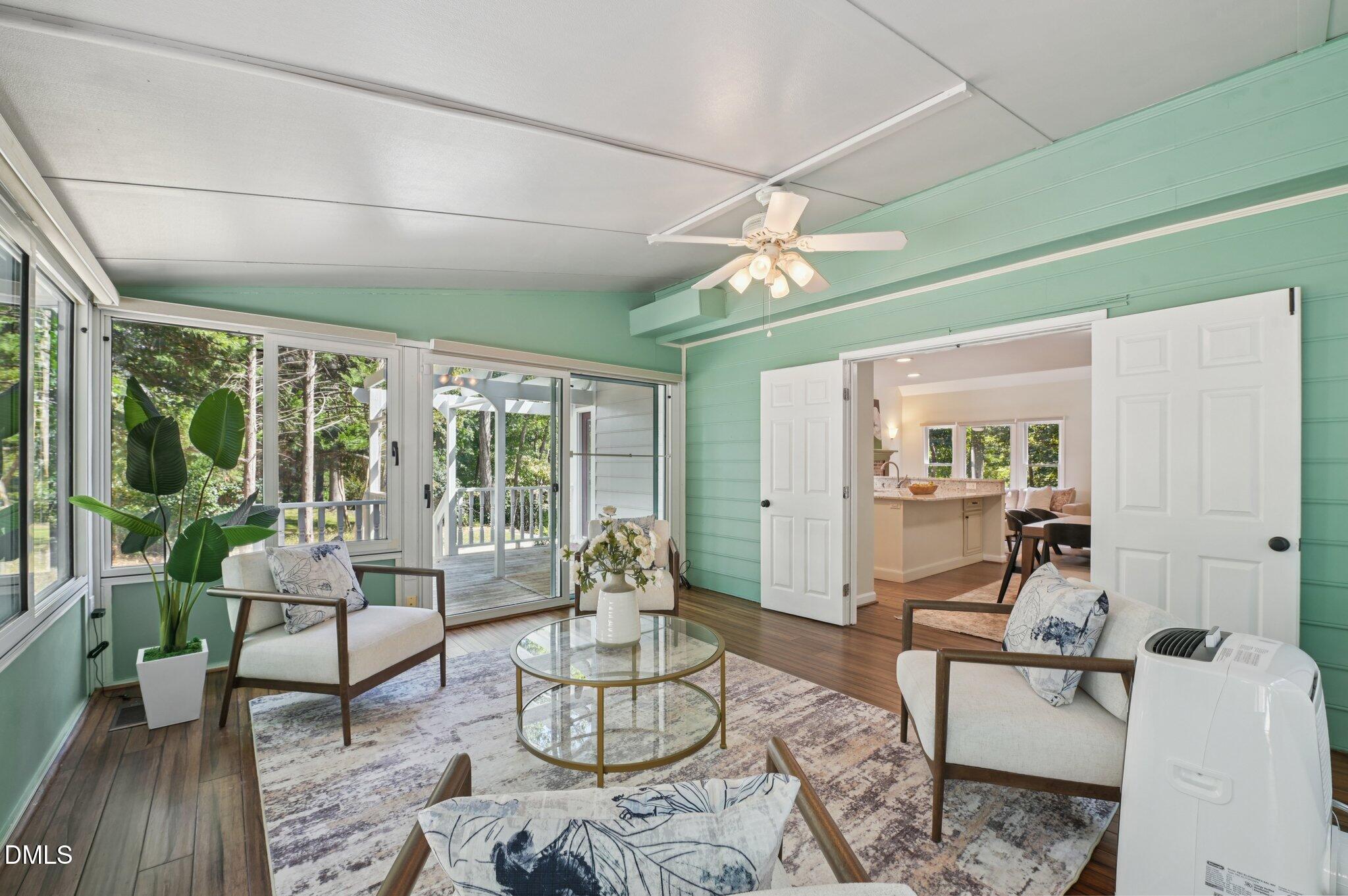 5965 Dunbarton Way Raleigh, NC 27613 - Photo 13 of 30 a living room with furniture and a large window