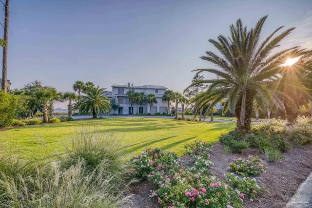 a view of a swimming pool with an outdoor space and seating area