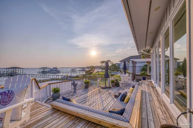a view of a balcony with an ocean view