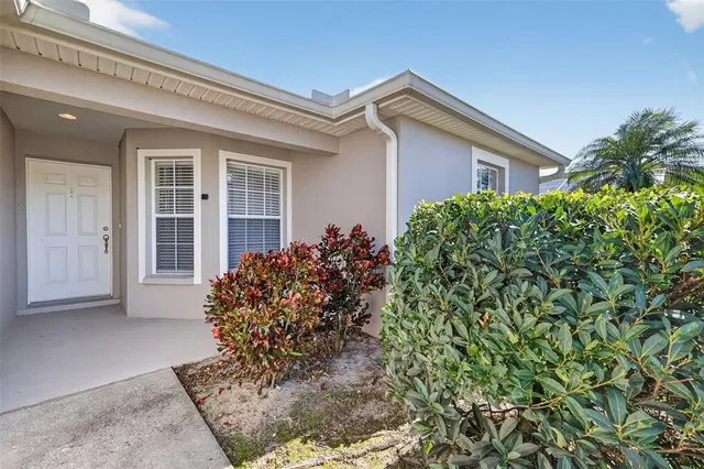 front view of a house with a garden