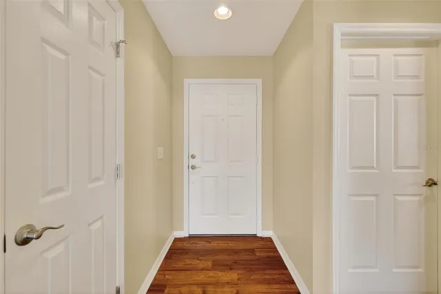 a view of a bathroom from a hallway