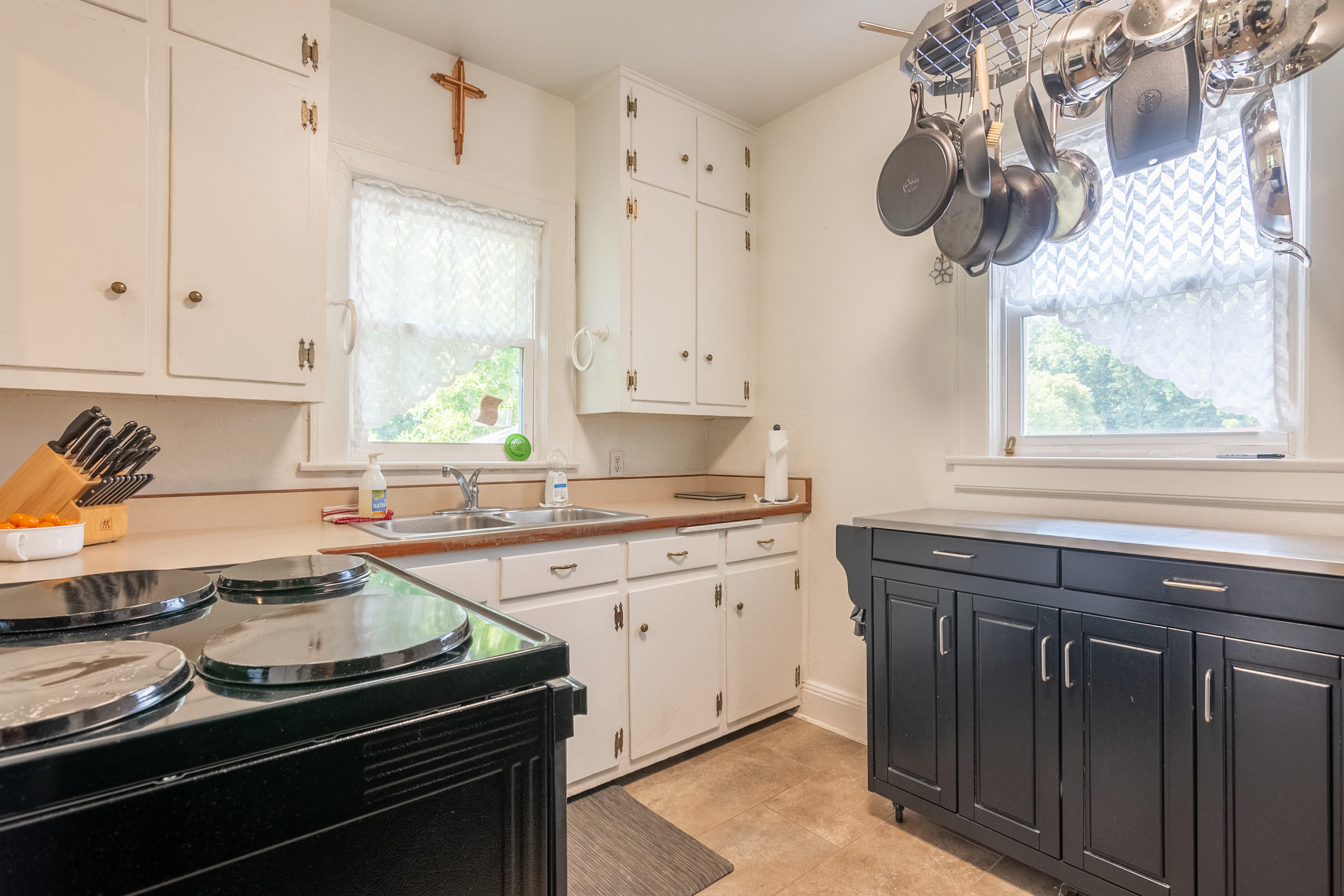 223 Newtown Road Northeast Floyd, VA 24091 - Photo 11 of 44 a kitchen with stainless steel appliances a stove a sink and a window