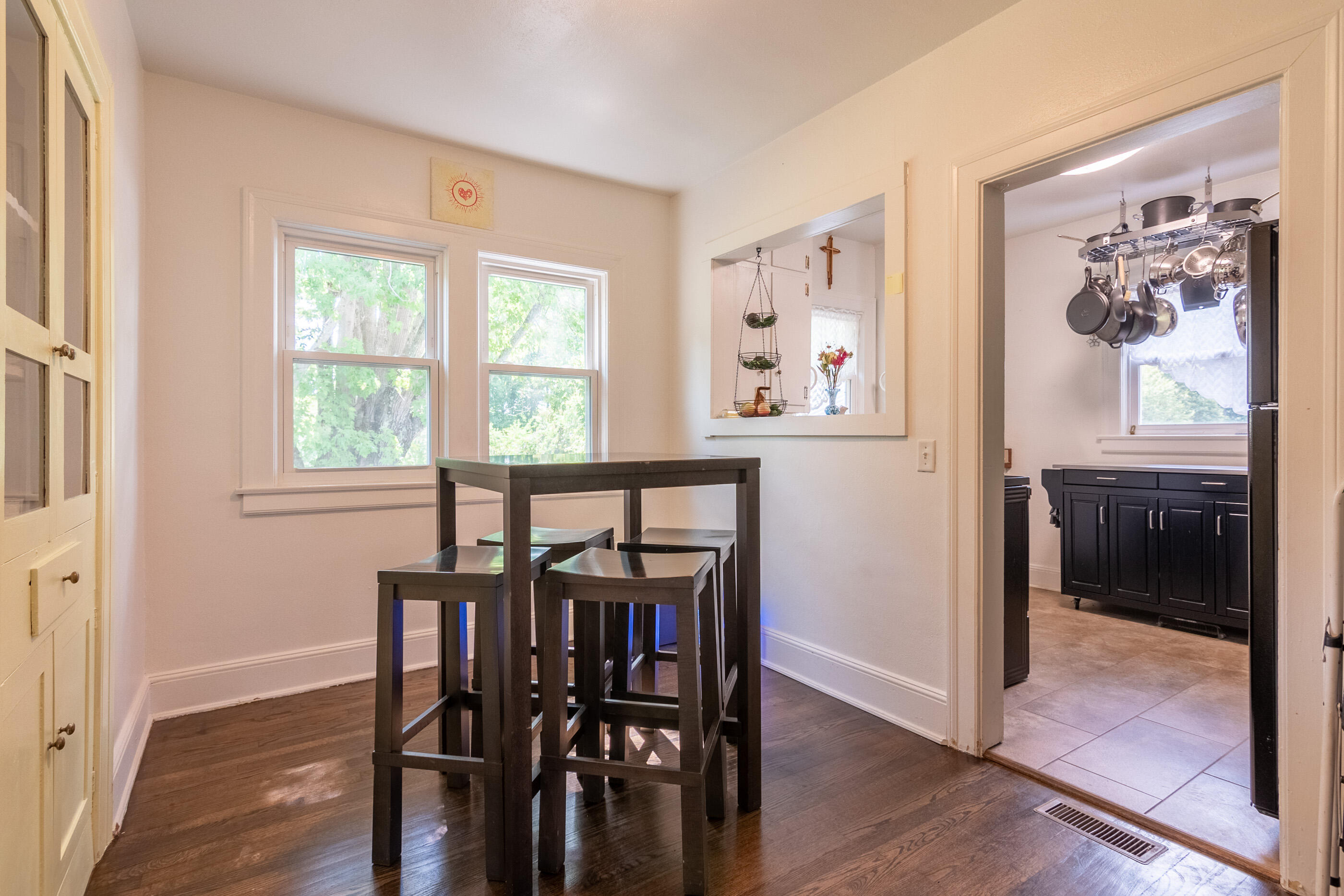 223 Newtown Road Northeast Floyd, VA 24091 - Photo 14 of 44 a view of a dining room with furniture window and wooden floor