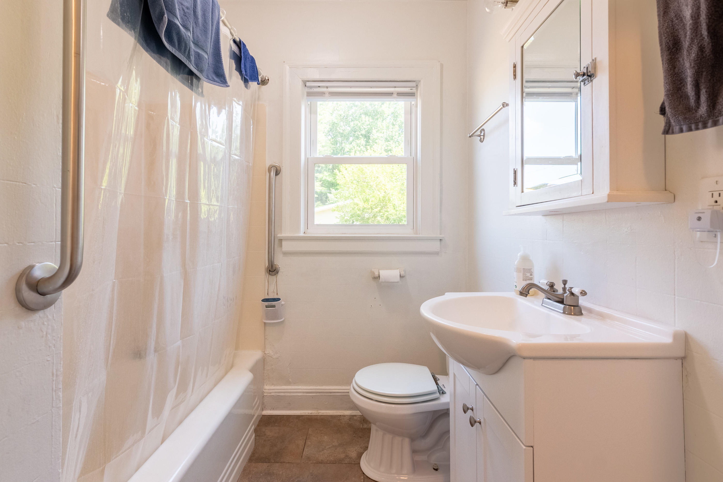 223 Newtown Road Northeast Floyd, VA 24091 - Photo 18 of 44 a bathroom with a sink a toilet and a window
