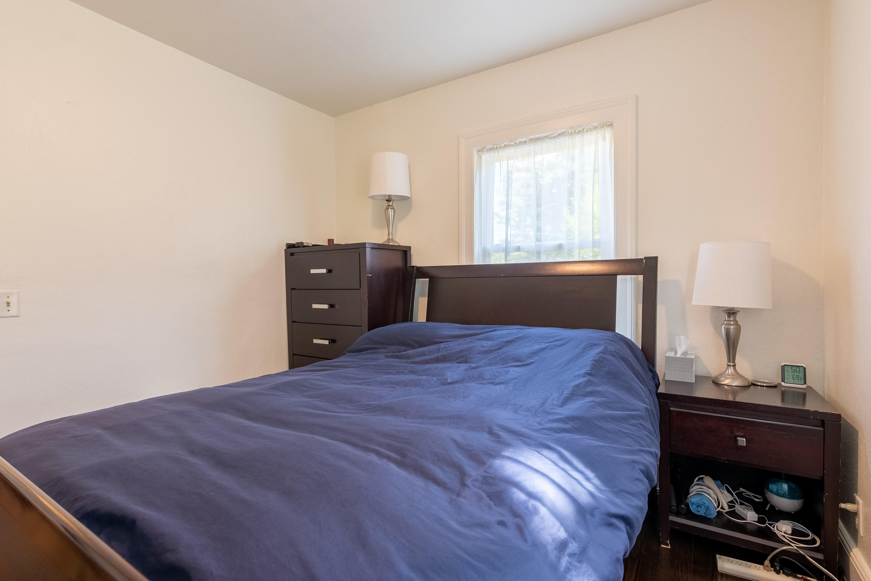 223 Newtown Road Northeast Floyd, VA 24091 - Photo 20 of 44 a bedroom with a bed and wooden floor