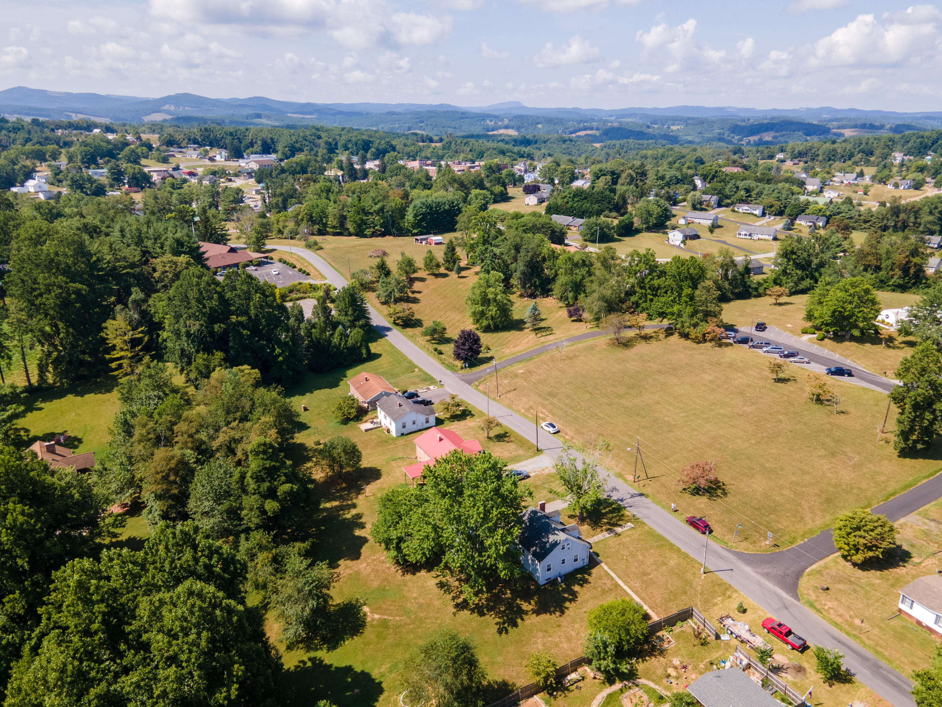 223 Newtown Road Northeast Floyd, VA 24091 - Photo 44 of 44 an aerial view of residential houses with outdoor space and trees