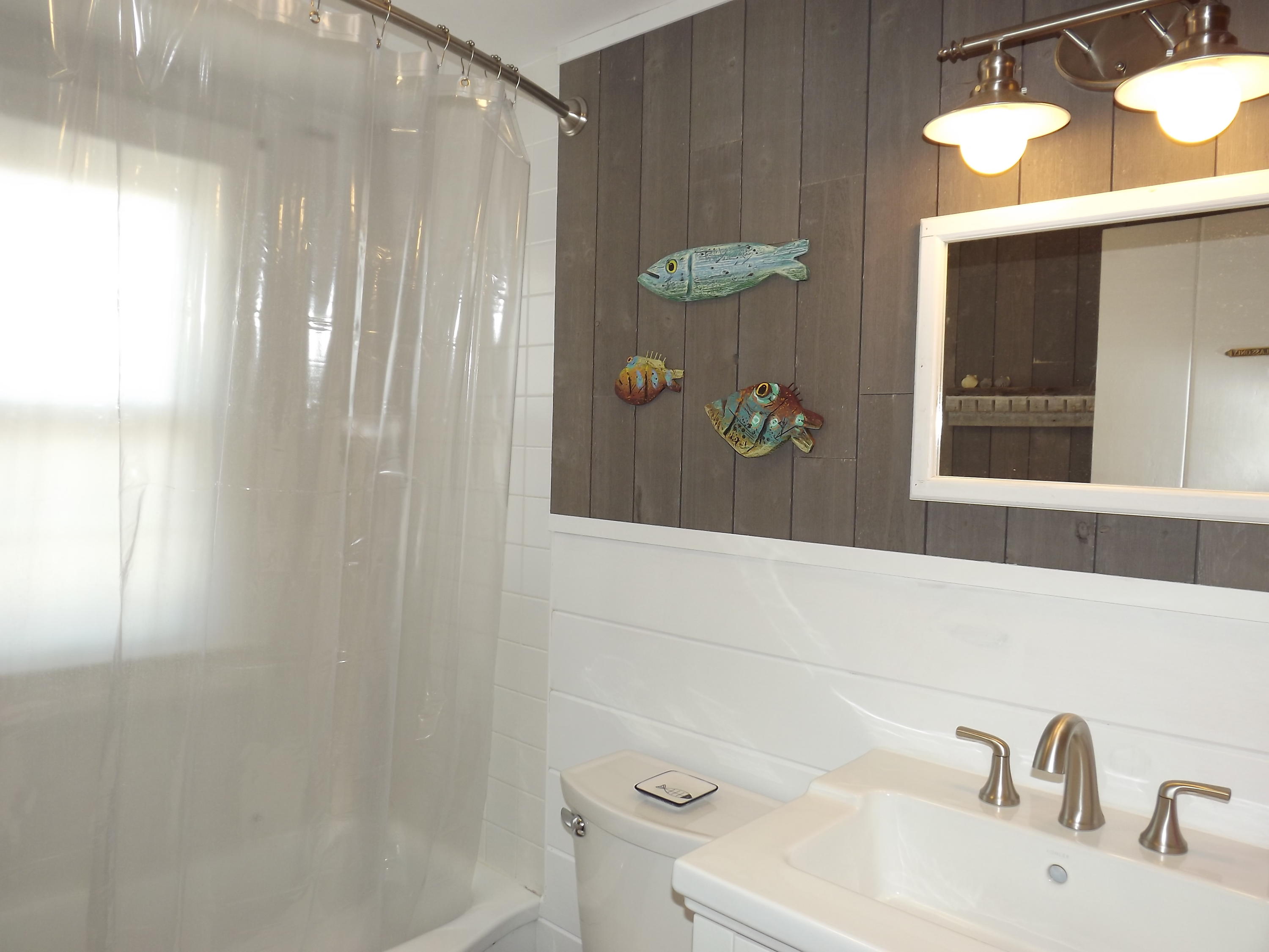 36 Tobey Turtle Road South Chatham, MA 02659 - Photo 17 of 21 a bathroom with a sink and mirror