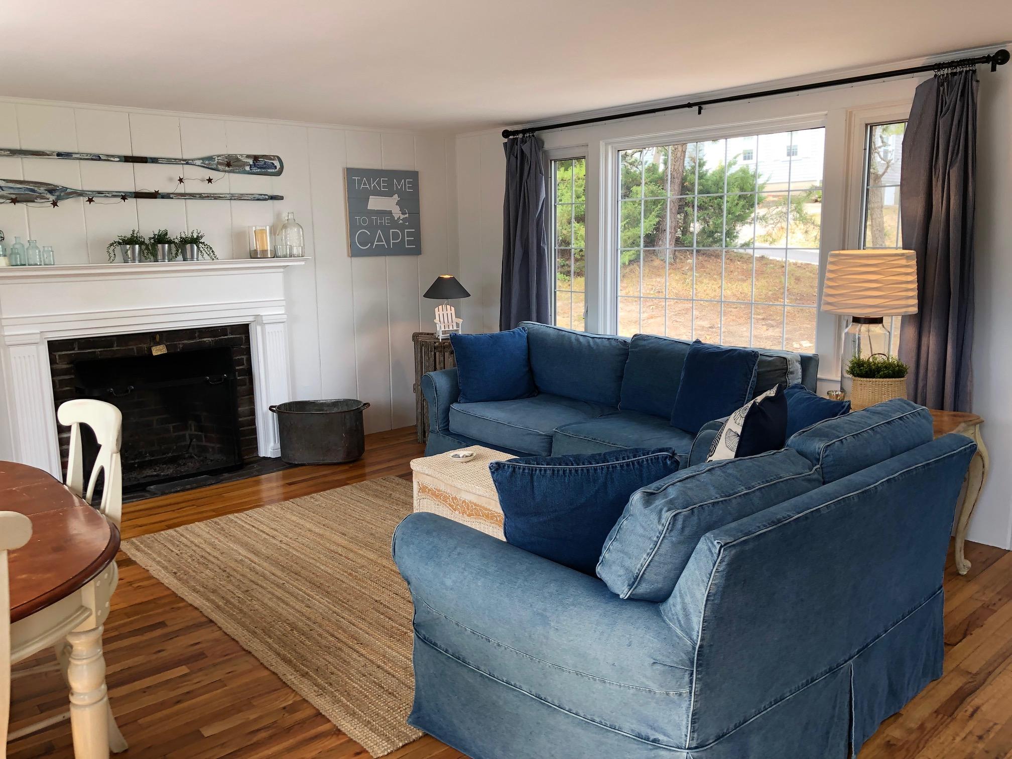 36 Tobey Turtle Road South Chatham, MA 02659 - Photo 4 of 21 a living room with furniture and a fireplace