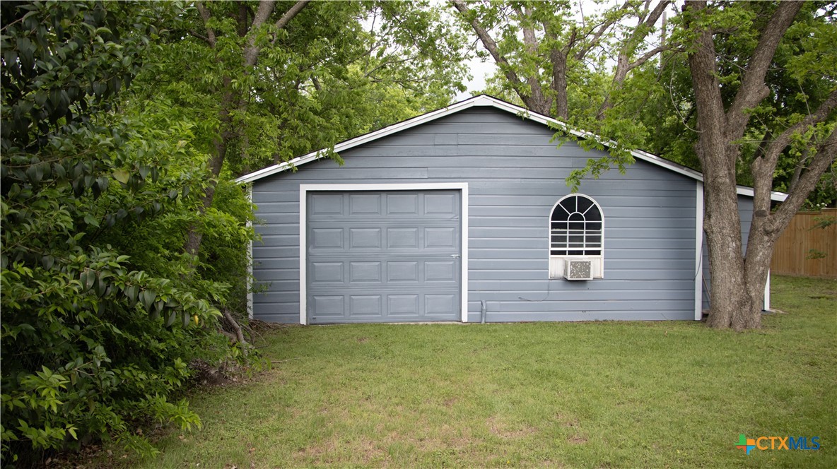 1407 South 7th Street Temple, TX 76504 - Photo 26 of 36 a view of a backyard of the house