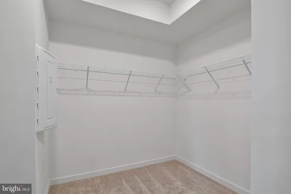 a view of a room with racks on the wall
