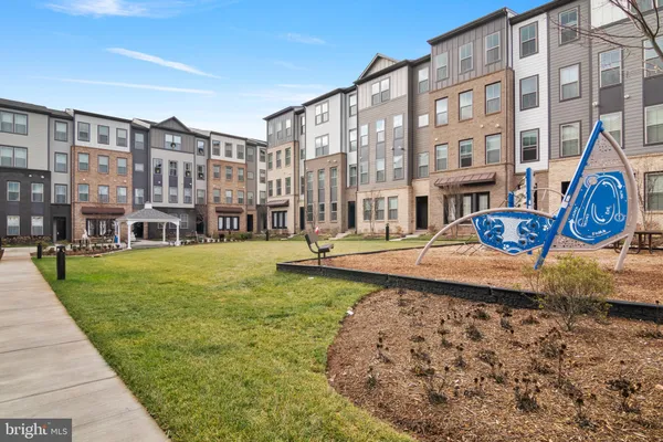 a view of a building with a yard
