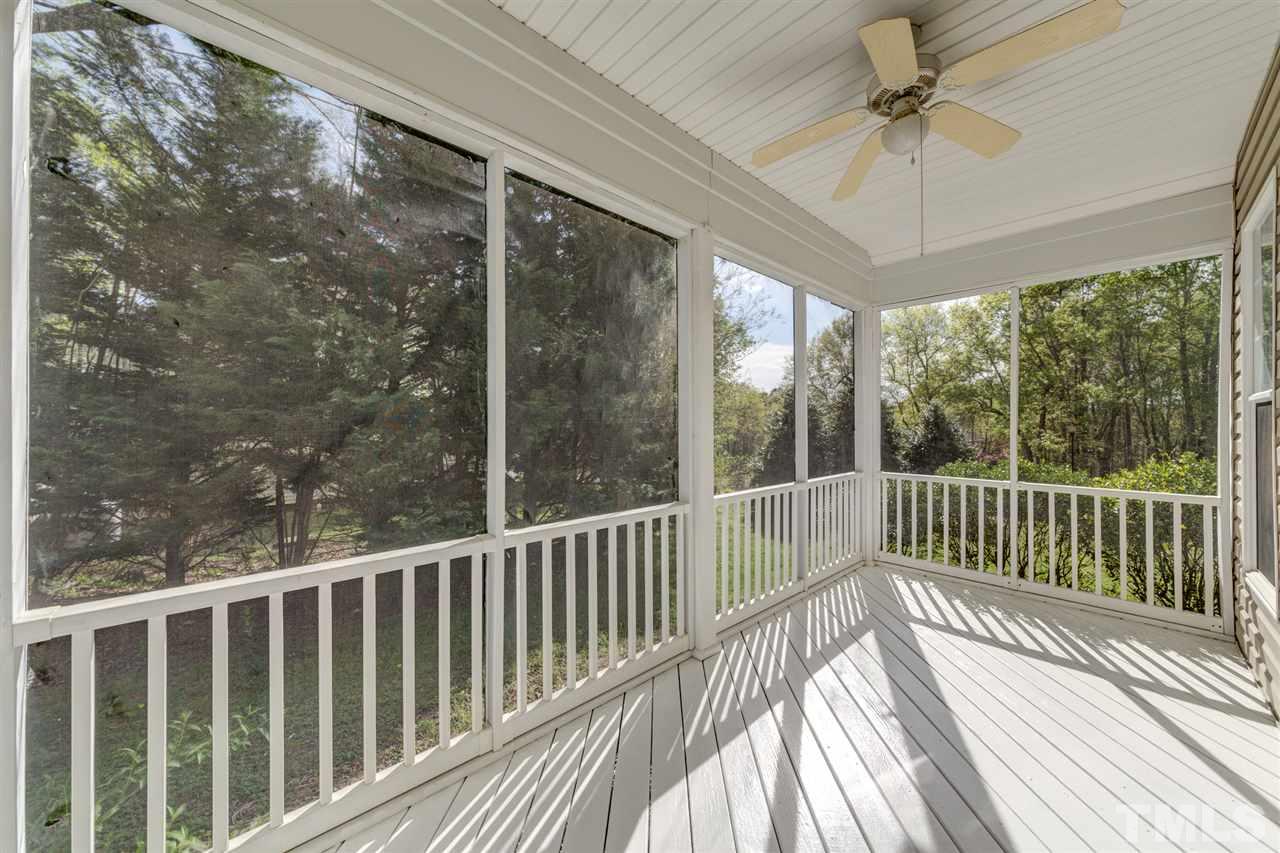 3709 Farmstone Drive Raleigh, NC 27603 - Photo 14 of 30 Private screened porch off of the guest room/home office space.