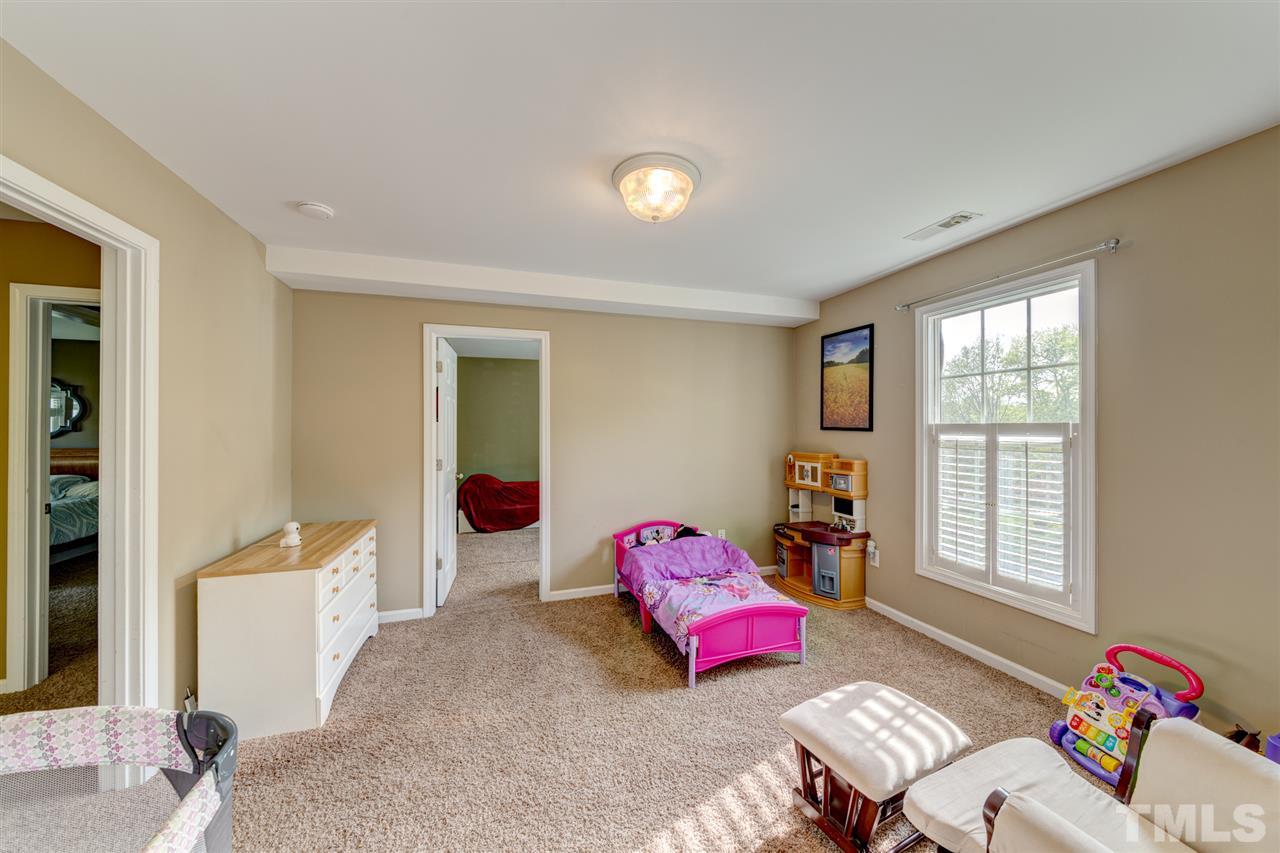 3709 Farmstone Drive Raleigh, NC 27603 - Photo 19 of 30 Located in the middle of the two 2nd floor bedrooms this space would be a great play space or hang out room for teenagers