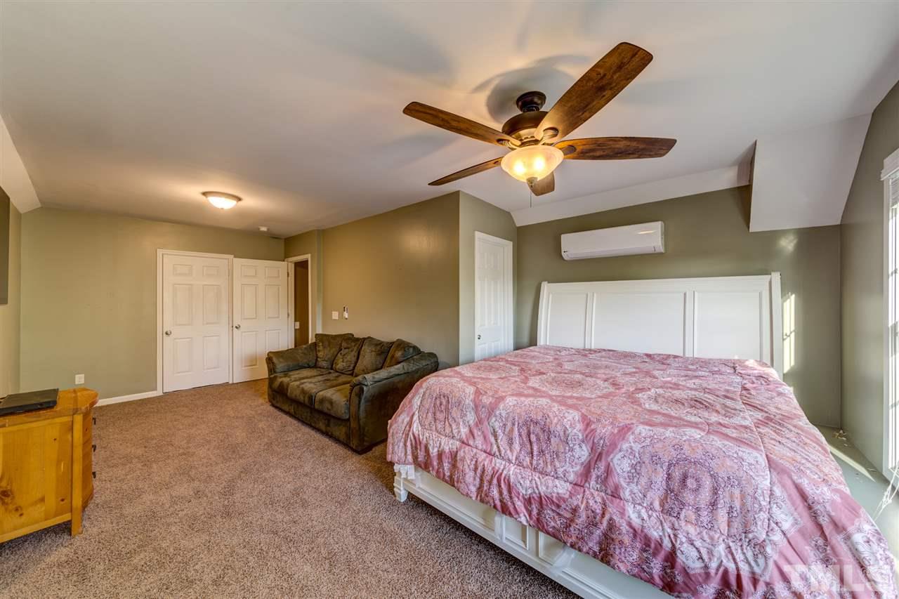 3709 Farmstone Drive Raleigh, NC 27603 - Photo 21 of 30 Private 3rd Floor Bonus or Teen Suite. Additional Attic Storage Space!