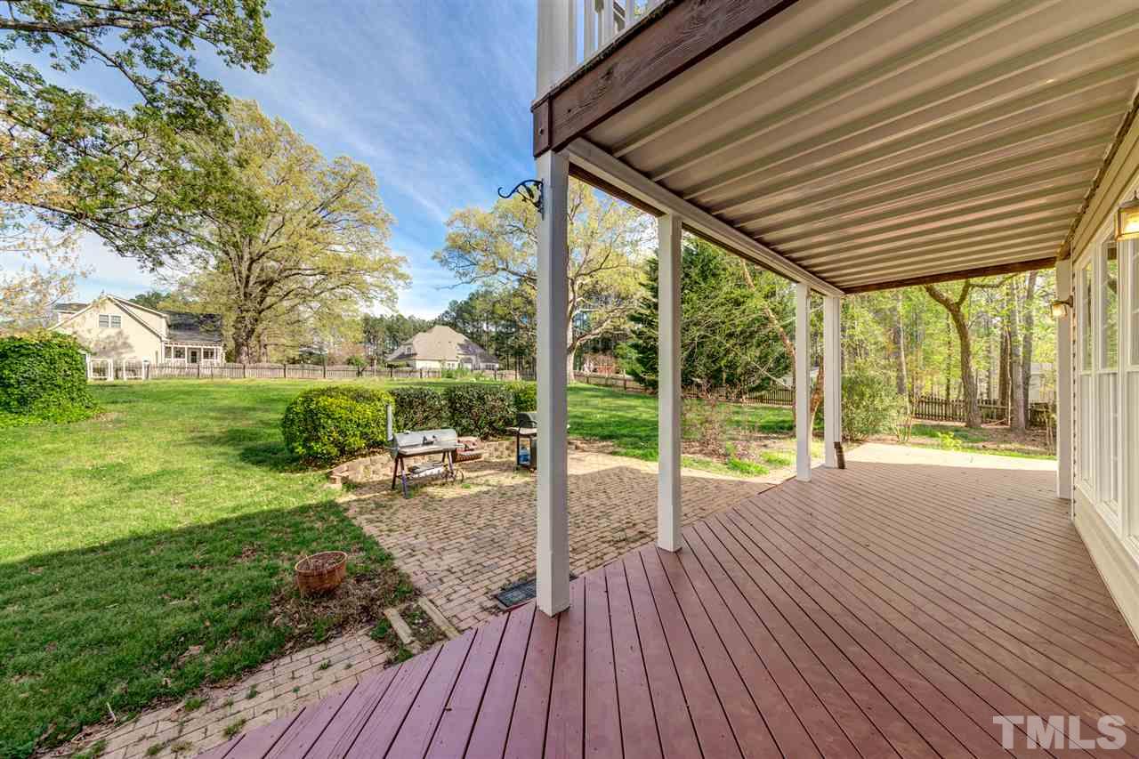 3709 Farmstone Drive Raleigh, NC 27603 - Photo 22 of 30 Enjoy warm nights on your rear deck. Views of Private Backyard