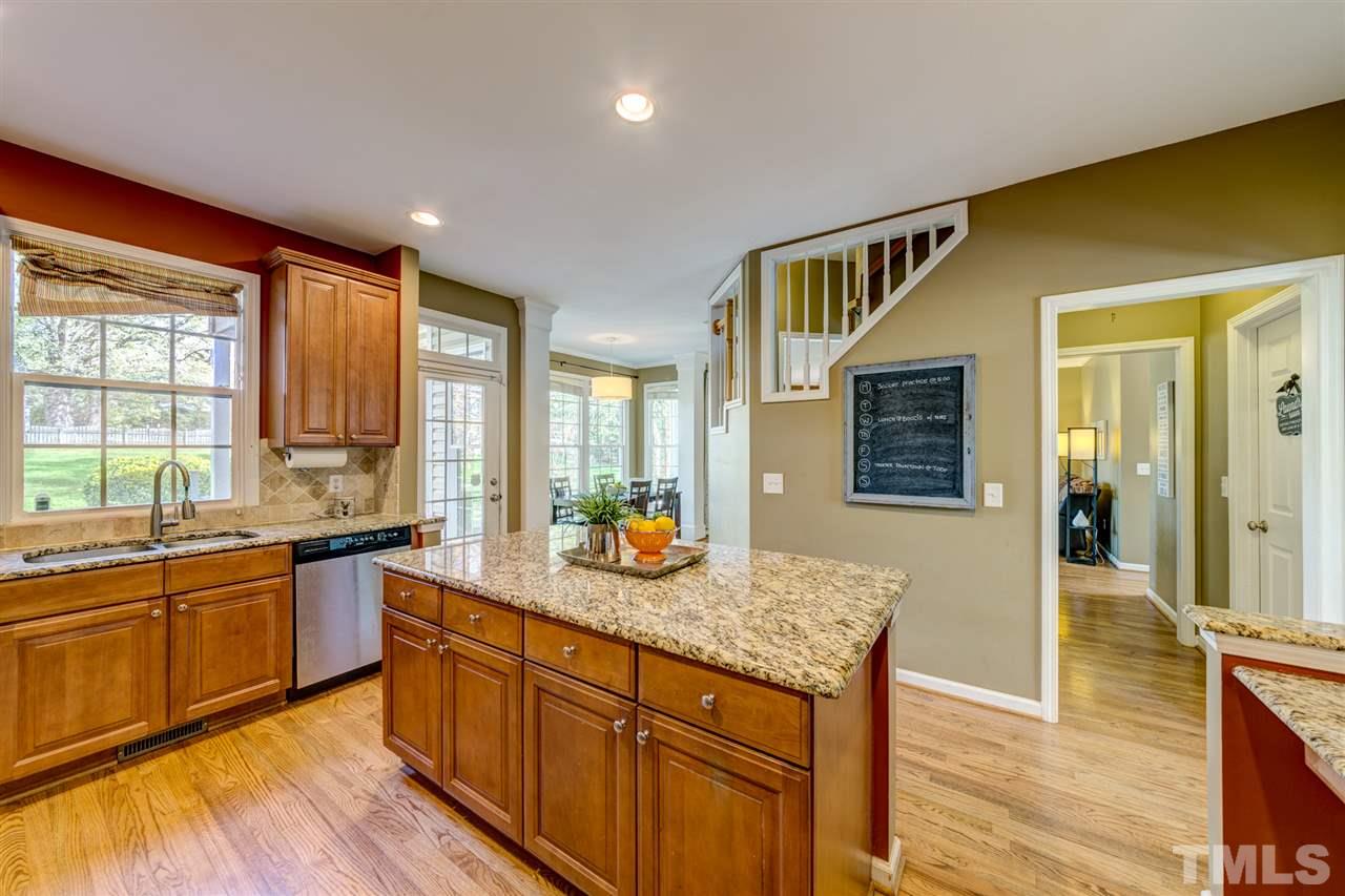 3709 Farmstone Drive Raleigh, NC 27603 - Photo 10 of 30 Sunny kitchen with breakfast nook and stainless steel appliances
