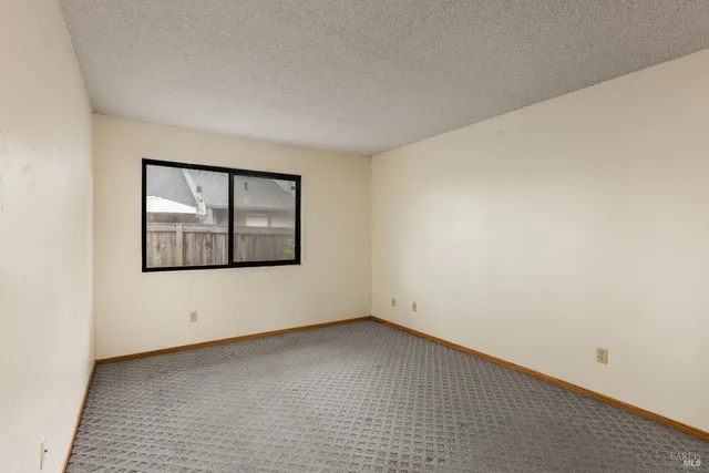 a view of an empty room with window