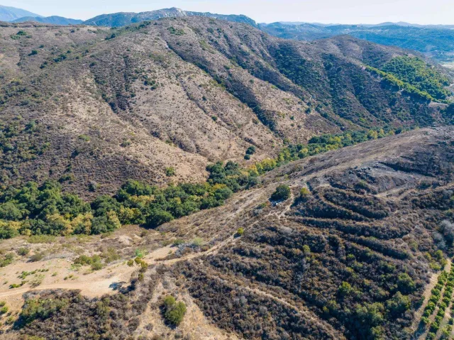 a view of a yard with mountain view