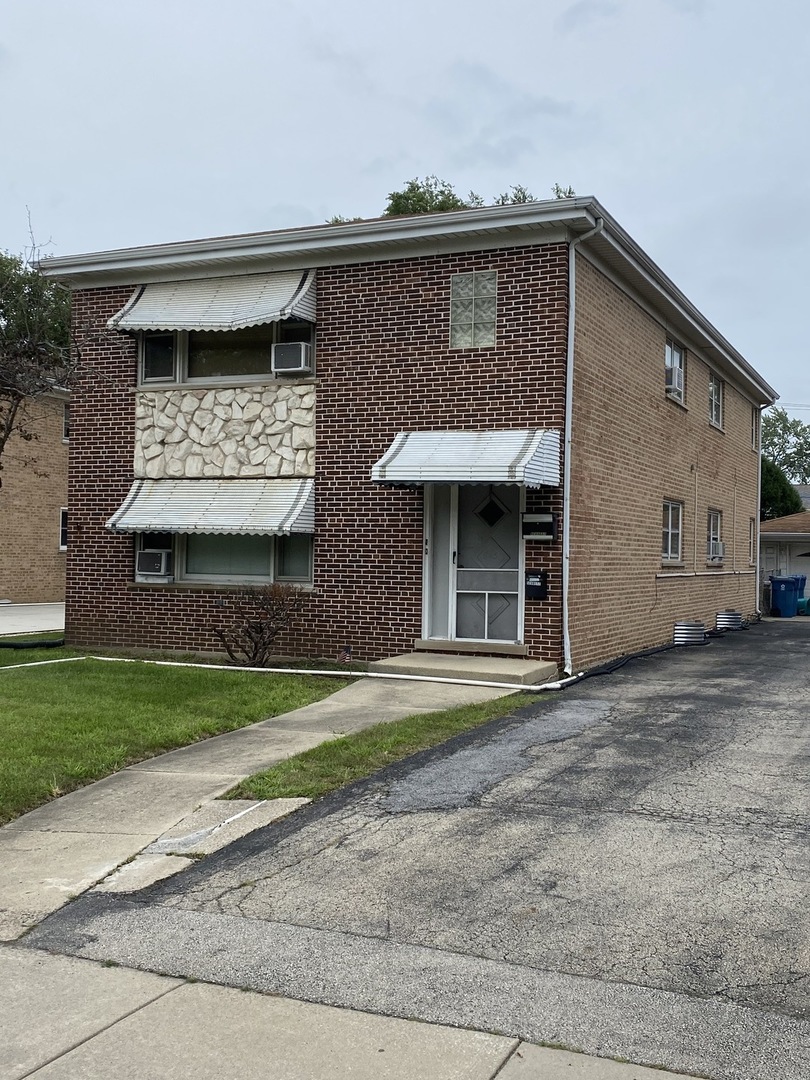 851 Addison Road Addison, IL 60101 - Photo 23 of 25 a view of a house with a outdoor space