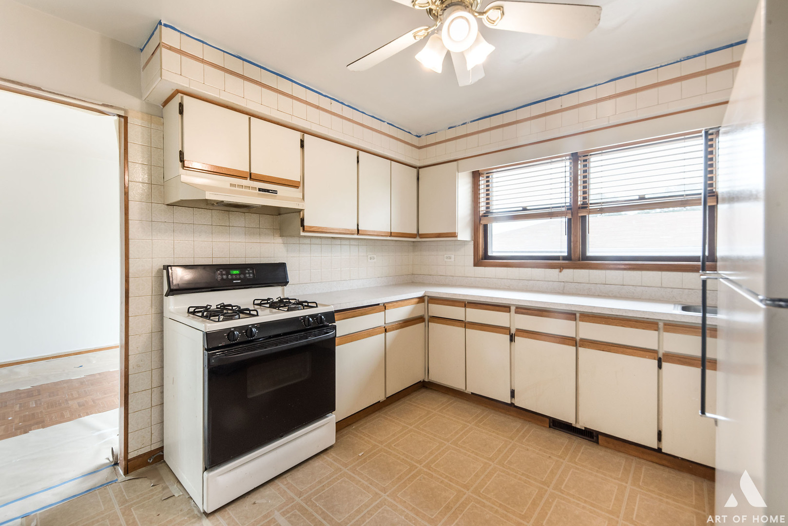 851 Addison Road Addison, IL 60101 - Photo 6 of 25 a kitchen with stainless steel appliances granite countertop a stove and a sink