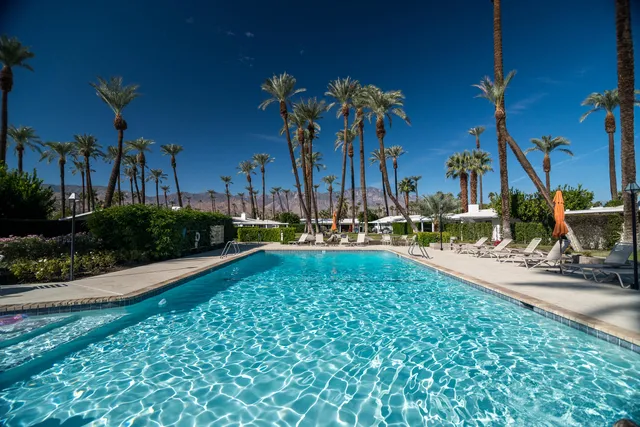 a view of a chairs and tables in the patio