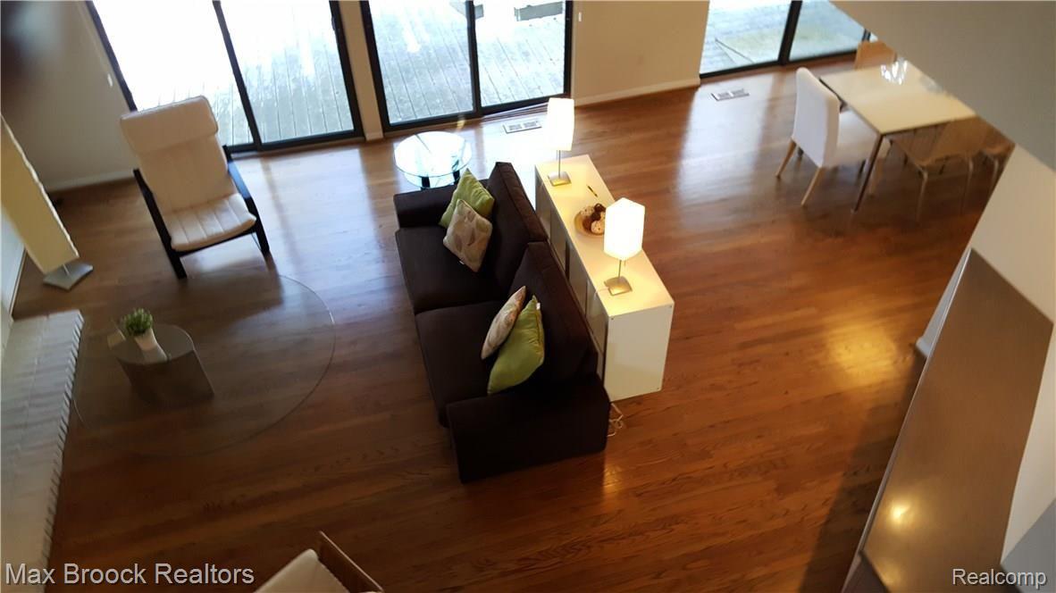 7226 Suncrest Road West Bloomfield, MI 48322 - Photo 21 of 44 Second floor cat-walk over looking the great room and dining area