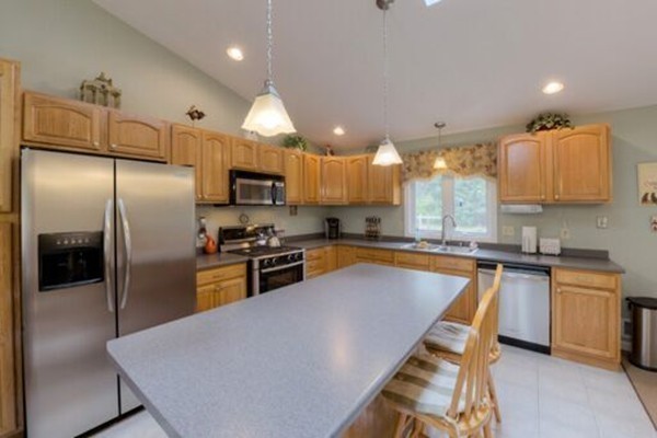 253 Malboeuf Road Ware, MA 01082 - Photo 5 of 30 a kitchen with stainless steel appliances granite countertop a refrigerator a stove a sink a microwave and a refrigerator