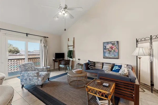 a kitchen with furniture a counter top space appliances and cabinets