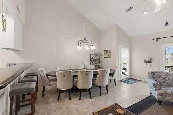 a kitchen with stainless steel appliances a sink stove and refrigerator