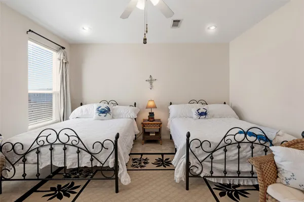 a view of a hallway with stairs