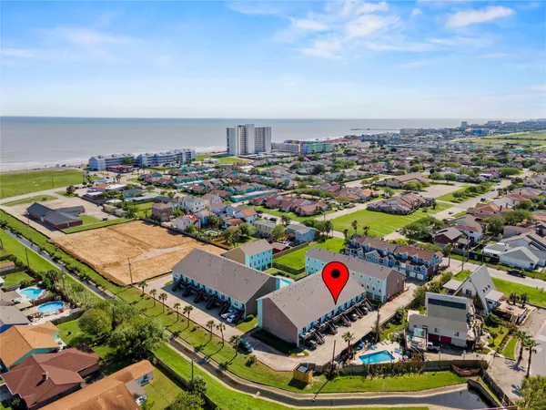a view of swimming pool with outdoor seating