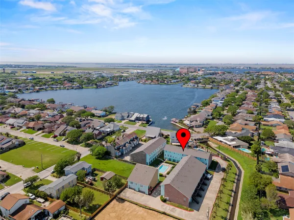 a view of a garden and iron fence