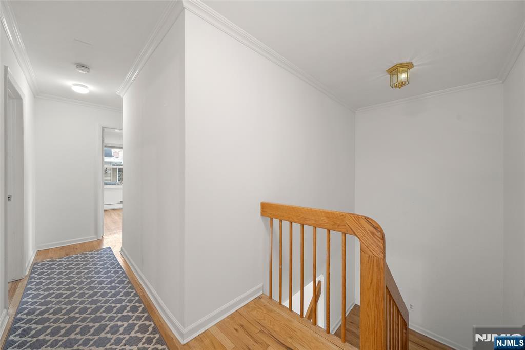 31 Hooks Lane Edgewater, NJ 07020 - Photo 13 of 31 a view of a room with wooden floor and bench