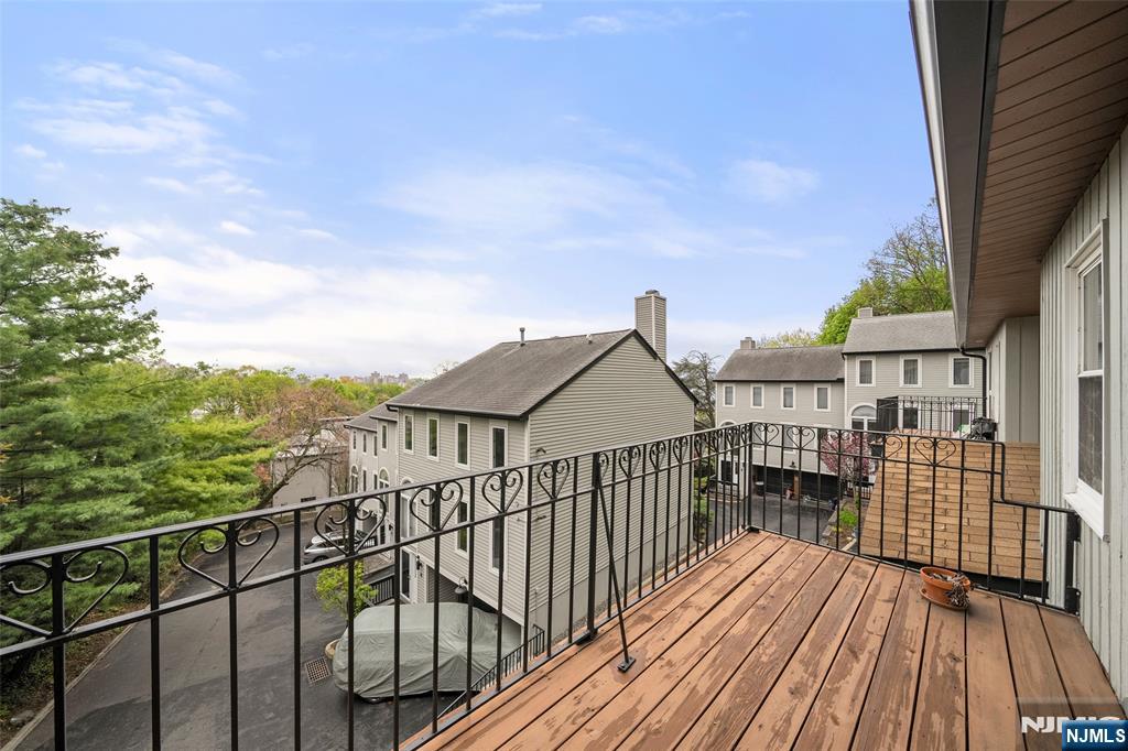 31 Hooks Lane Edgewater, NJ 07020 - Photo 19 of 31 a view of a balcony with wooden floor and city view