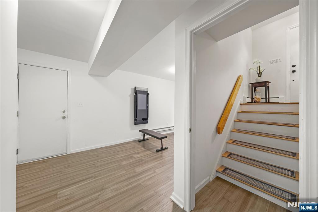 31 Hooks Lane Edgewater, NJ 07020 - Photo 24 of 31 a view of an entryway with wooden floor