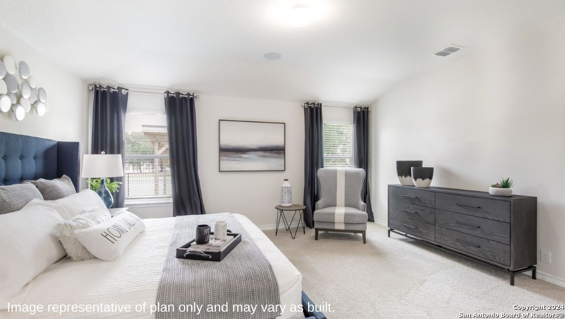 6010 Strasse Way San Antonio, TX 78252 - Photo 11 of 37 a bedroom with furniture and a wooden floor