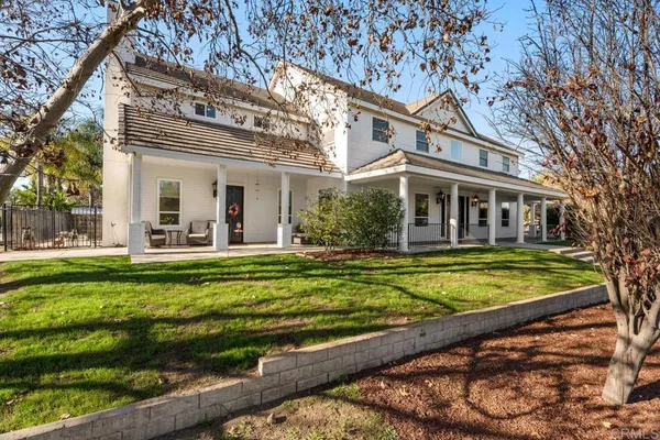 a view of a house with a swimming pool