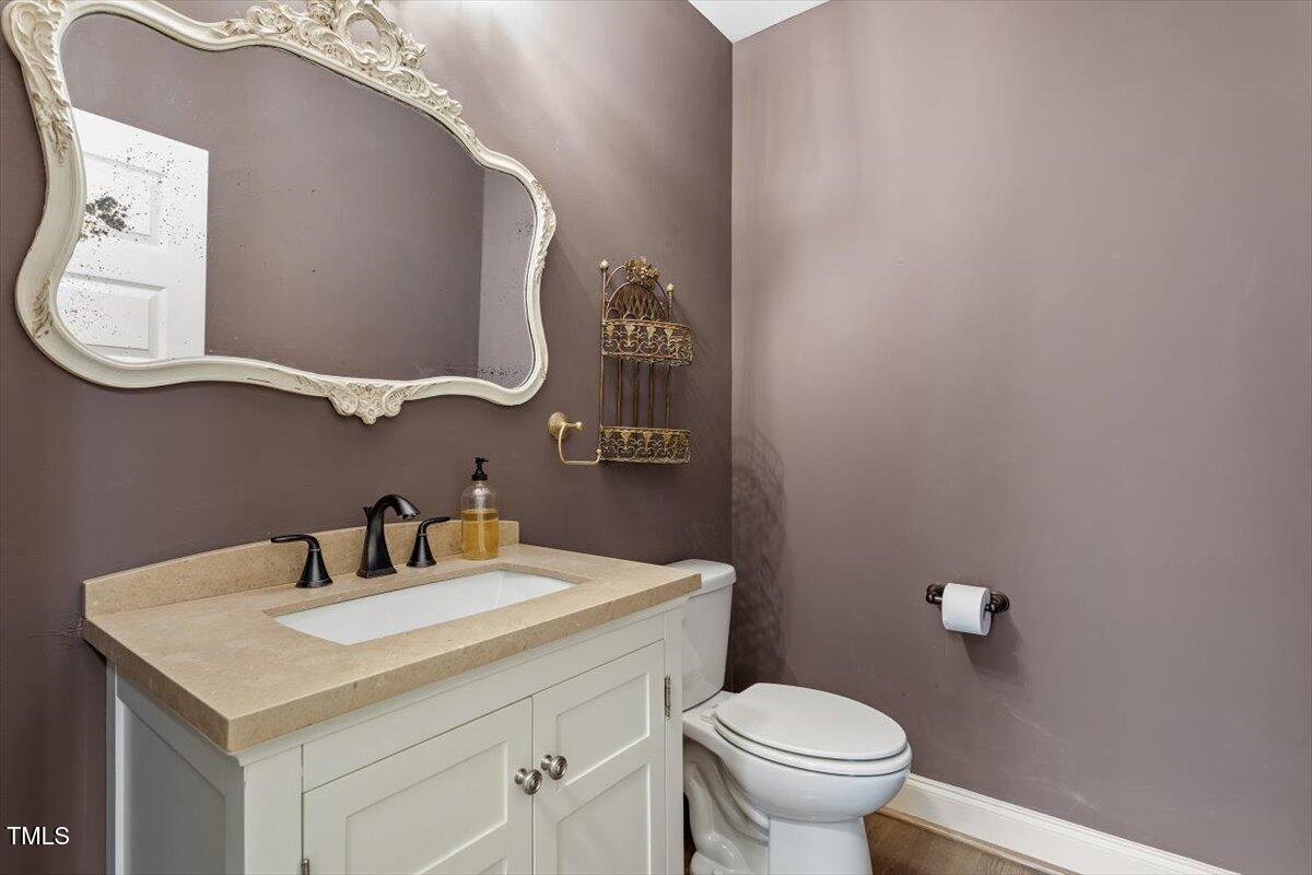 124 Lord Ashley Road Raleigh, NC 27610 - Photo 21 of 32 first floor half bath