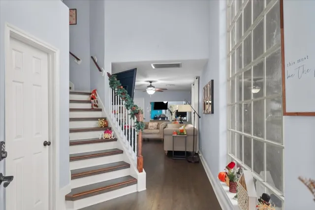 a view of entryway with livingroom and stairs