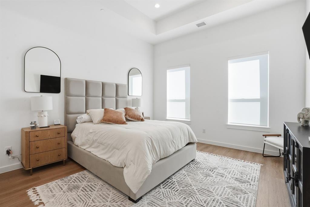 1301 Tillery Court Grapevine, TX 76051 - Photo 10 of 28 a bedroom with a bed and a window